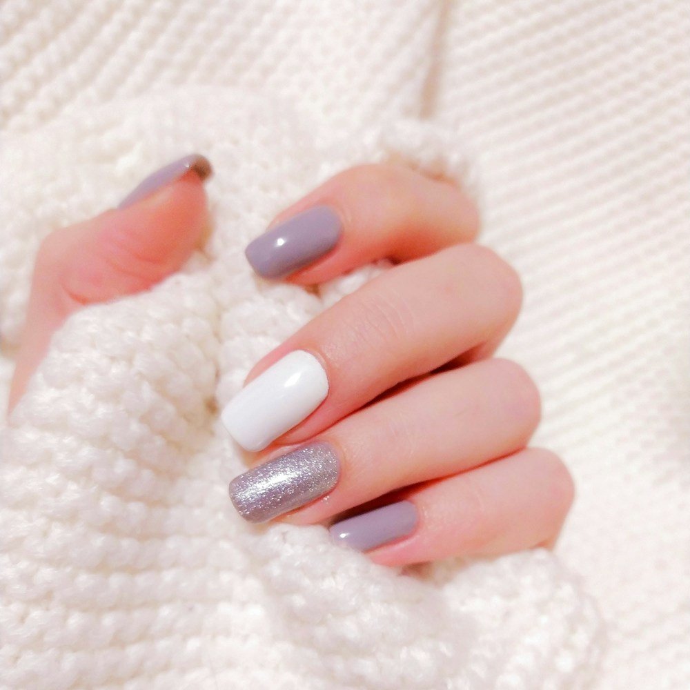 Mauve, white and silver glitter nails